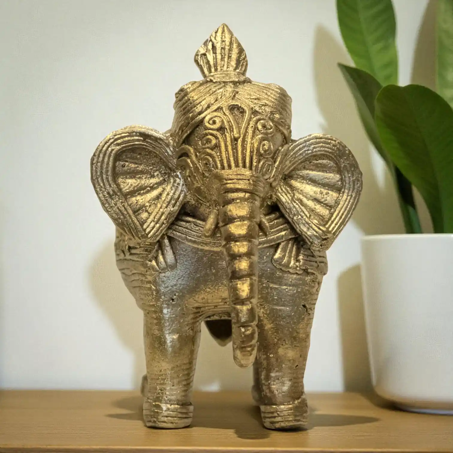 Front view of handcrafted elephant dokra metal craft from Karuka.
