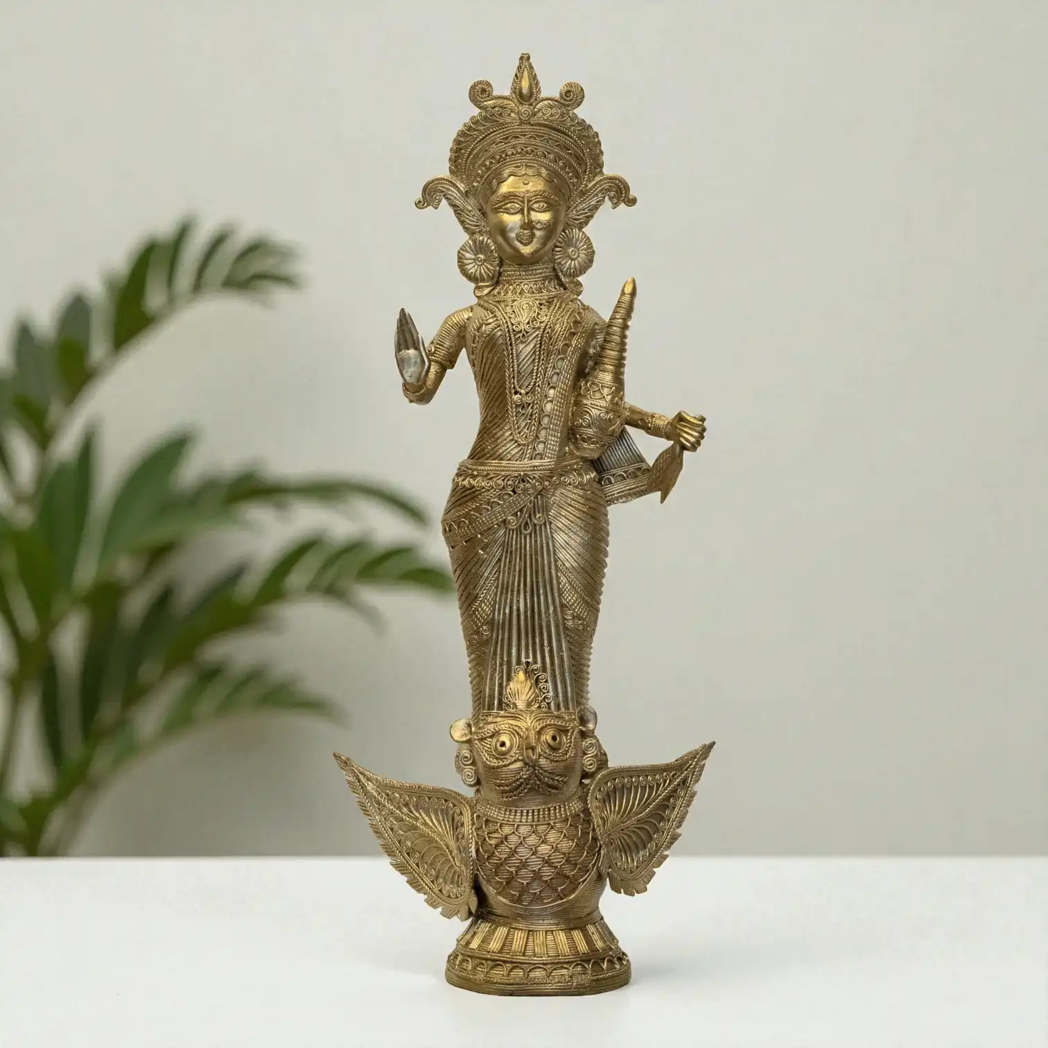 Front view of Laxmi standing dokra metal craft from Karuka.